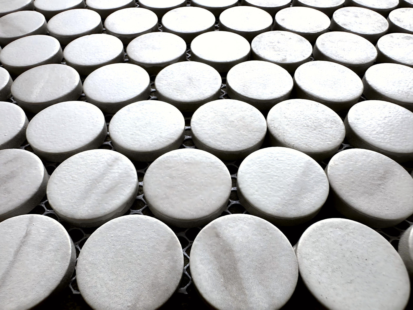 Porcelain Mosaic Penny round Matt Carrara Look